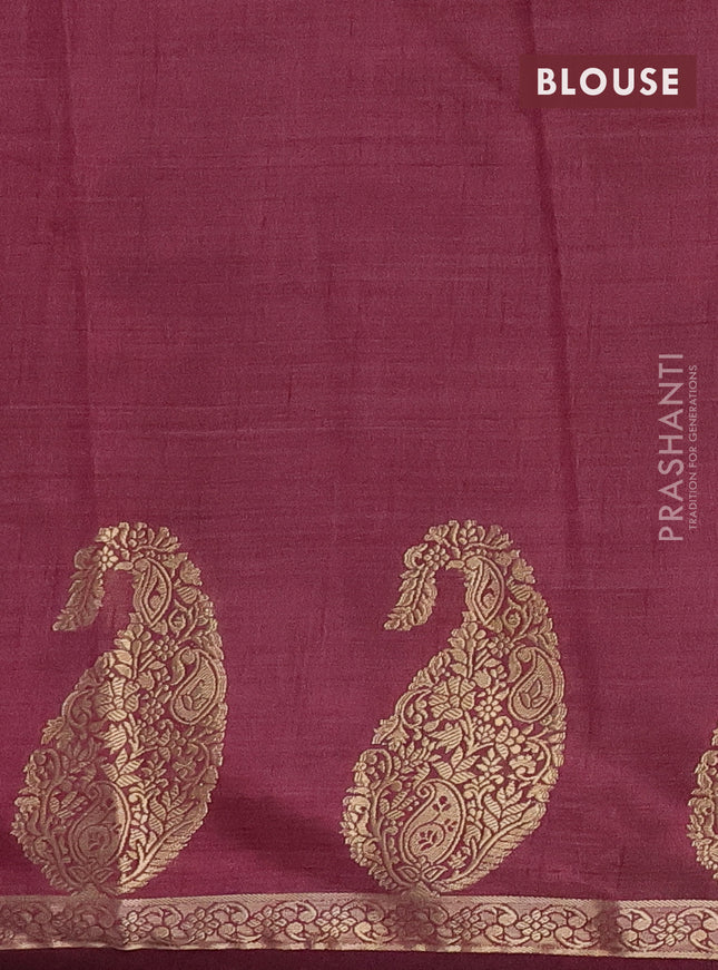 Semi raw silk saree wine shade with plain body and paisley design zari woven butta border