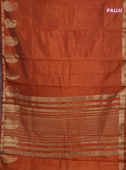 Semi raw silk saree rust shade with plain body and paisley design zari woven butta border
