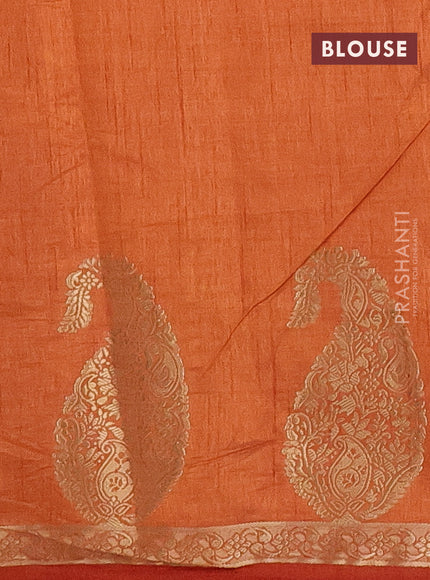 Semi raw silk saree rust shade with plain body and paisley design zari woven butta border