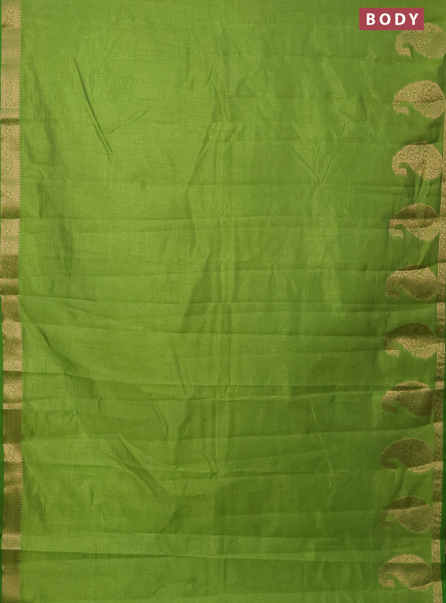 Semi raw silk saree green with plain body and paisley design zari woven butta border