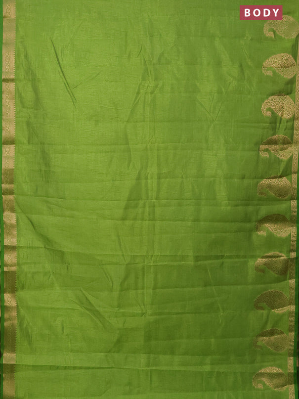 Semi raw silk saree green with plain body and paisley design zari woven butta border