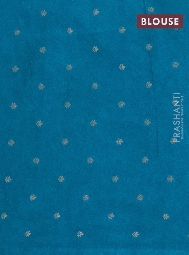 Semi raw silk saree teal blue with zari weaves & elephant buttas and elephant design zari woven border