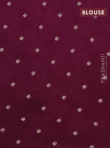 Semi raw silk saree wine shade with zari weaves & elephant buttas and elephant design zari woven border