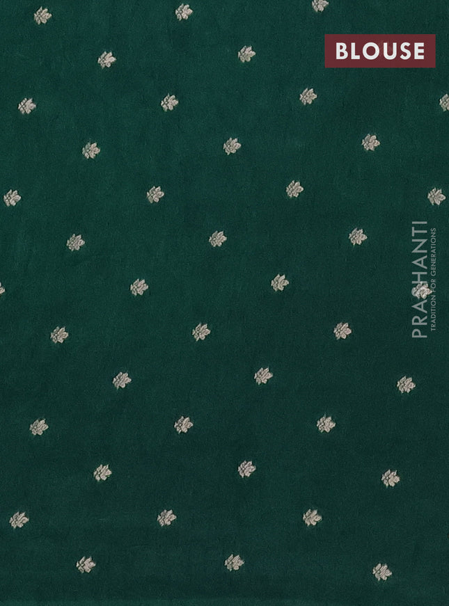 Semi raw silk saree green with zari weaves & elephant buttas and elephant design zari woven border