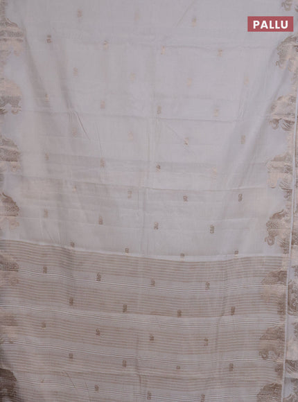 Semi raw silk saree off white with zari weaves & elephant buttas and elephant design zari woven border