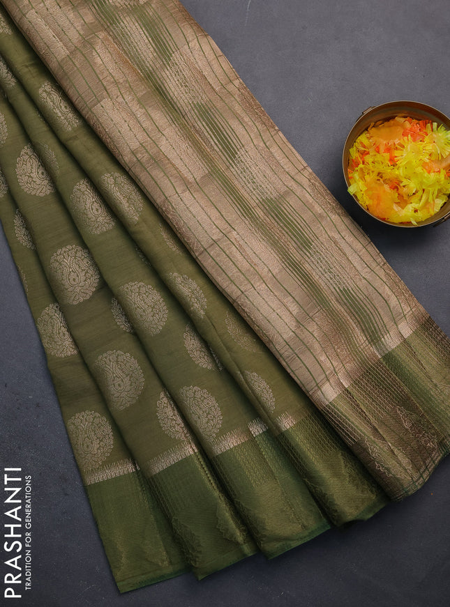 Semi raw silk saree sap green with zari woven buttas and zari woven simple border