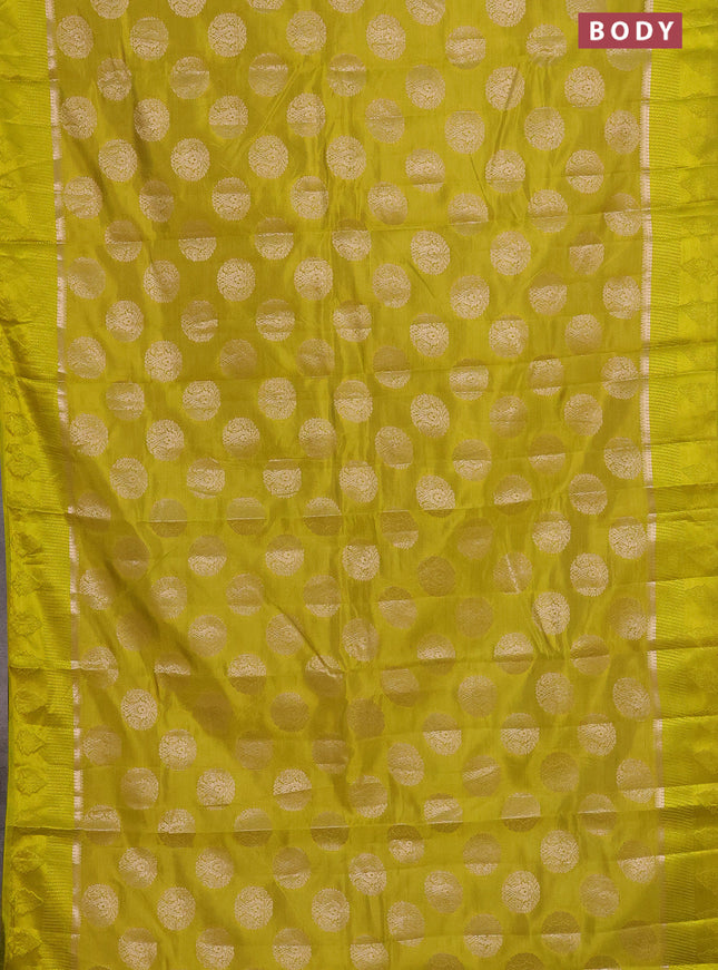 Semi raw silk saree lime yellow with zari woven buttas and zari woven simple border