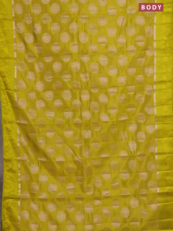 Semi raw silk saree lime yellow with zari woven buttas and zari woven simple border