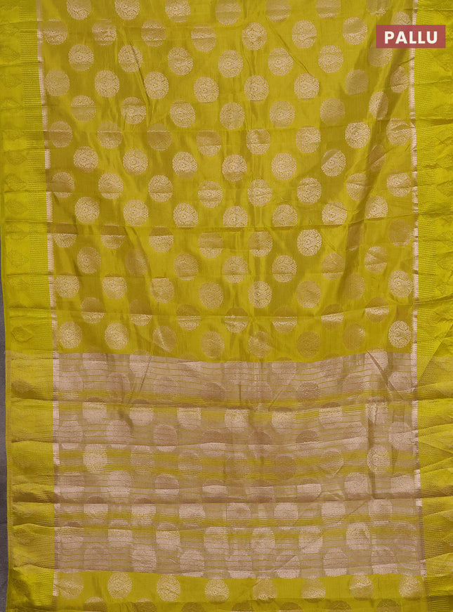 Semi raw silk saree lime yellow with zari woven buttas and zari woven simple border