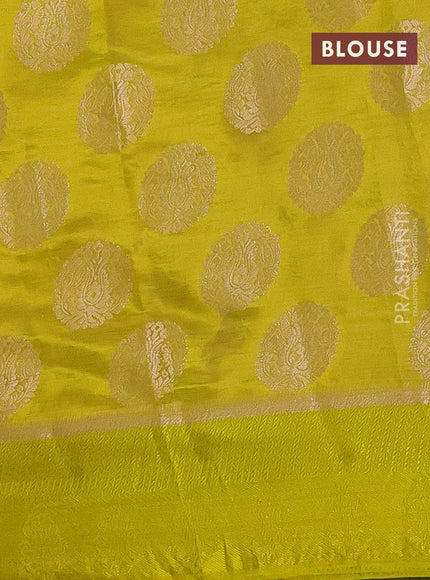 Semi raw silk saree lime yellow with zari woven buttas and zari woven simple border