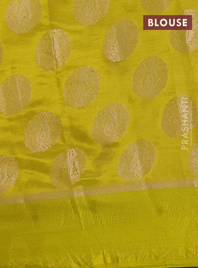 Semi raw silk saree lime yellow with zari woven buttas and zari woven simple border