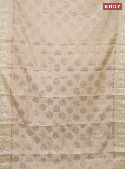 Semi raw silk saree cream with zari woven buttas and zari woven simple border