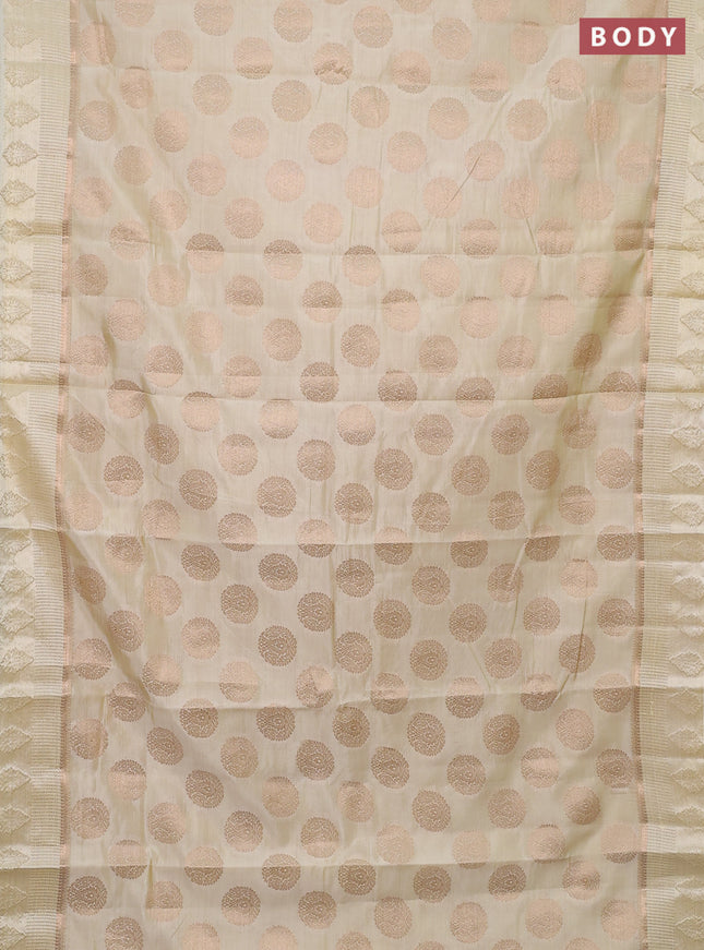 Semi raw silk saree cream with zari woven buttas and zari woven simple border