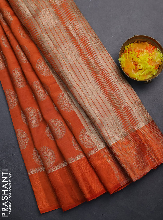 Semi raw silk saree orange with zari woven buttas and zari woven simple border