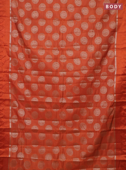 Semi raw silk saree orange with zari woven buttas and zari woven simple border