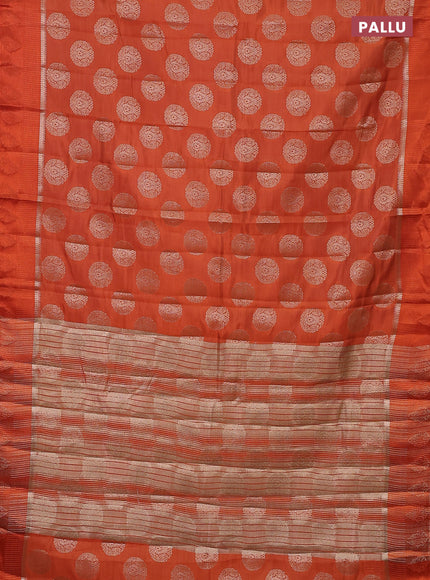 Semi raw silk saree orange with zari woven buttas and zari woven simple border