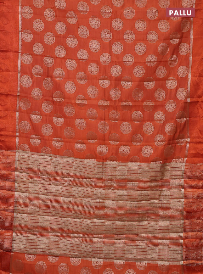 Semi raw silk saree orange with zari woven buttas and zari woven simple border