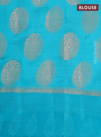Semi raw silk saree teal blue with zari woven buttas and zari woven simple border