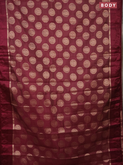 Semi raw silk saree wine shade with zari woven buttas and zari woven simple border