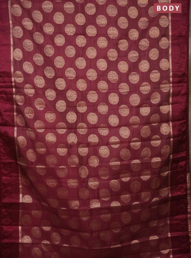 Semi raw silk saree wine shade with zari woven buttas and zari woven simple border