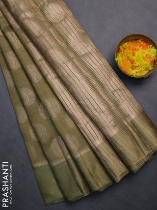 Semi raw silk saree pastel green with zari woven buttas and zari woven simple border