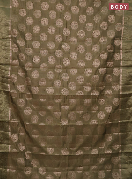 Semi raw silk saree pastel green with zari woven buttas and zari woven simple border