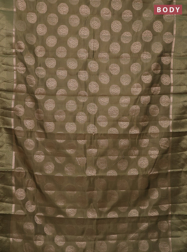 Semi raw silk saree pastel green with zari woven buttas and zari woven simple border