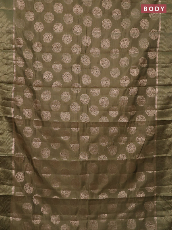 Semi raw silk saree pastel green with zari woven buttas and zari woven simple border