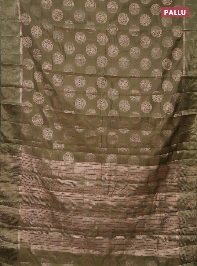 Semi raw silk saree pastel green with zari woven buttas and zari woven simple border