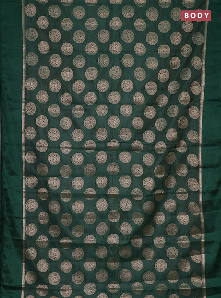 Semi raw silk saree green with zari woven buttas and zari woven simple border