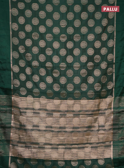 Semi raw silk saree green with zari woven buttas and zari woven simple border