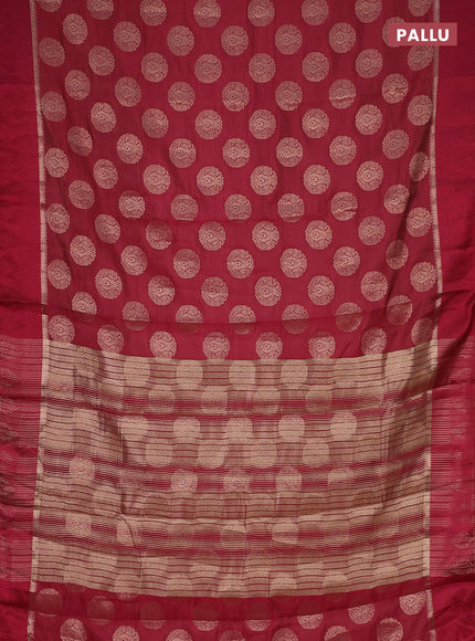 Semi raw silk saree dark pibk with zari woven buttas and zari woven simple border