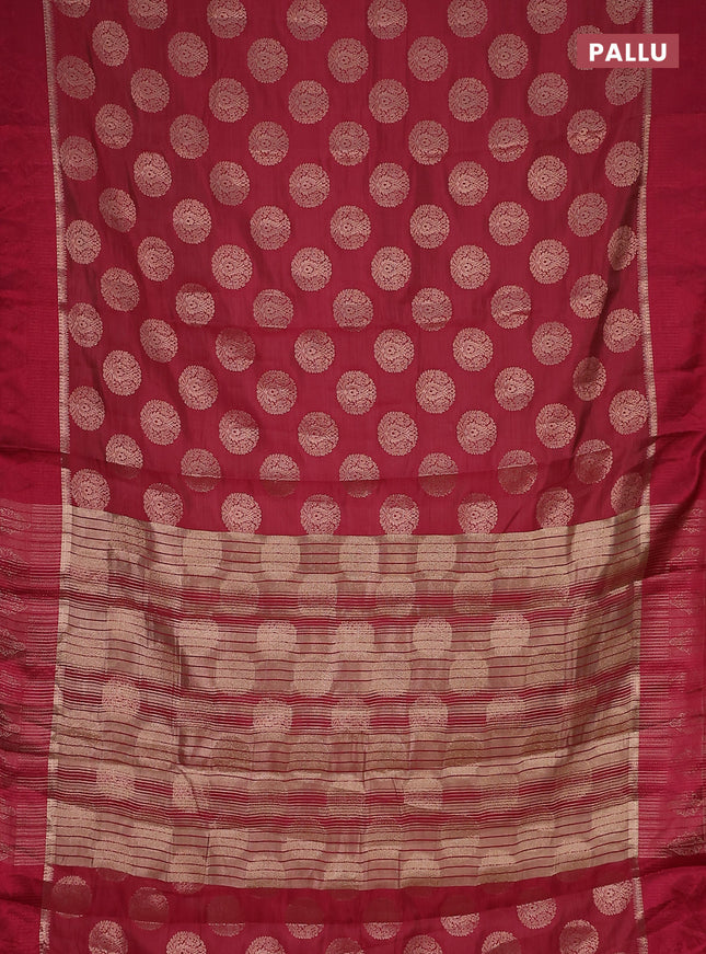 Semi raw silk saree dark pibk with zari woven buttas and zari woven simple border