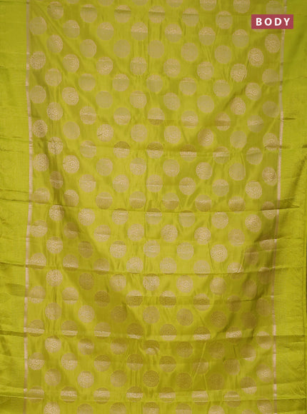 Semi raw silk saree lime green with zari woven buttas and zari woven simple border