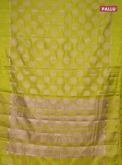 Semi raw silk saree lime green with zari woven buttas and zari woven simple border