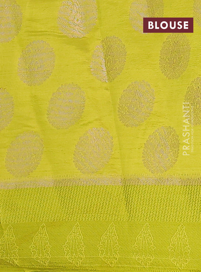 Semi raw silk saree lime green with zari woven buttas and zari woven simple border