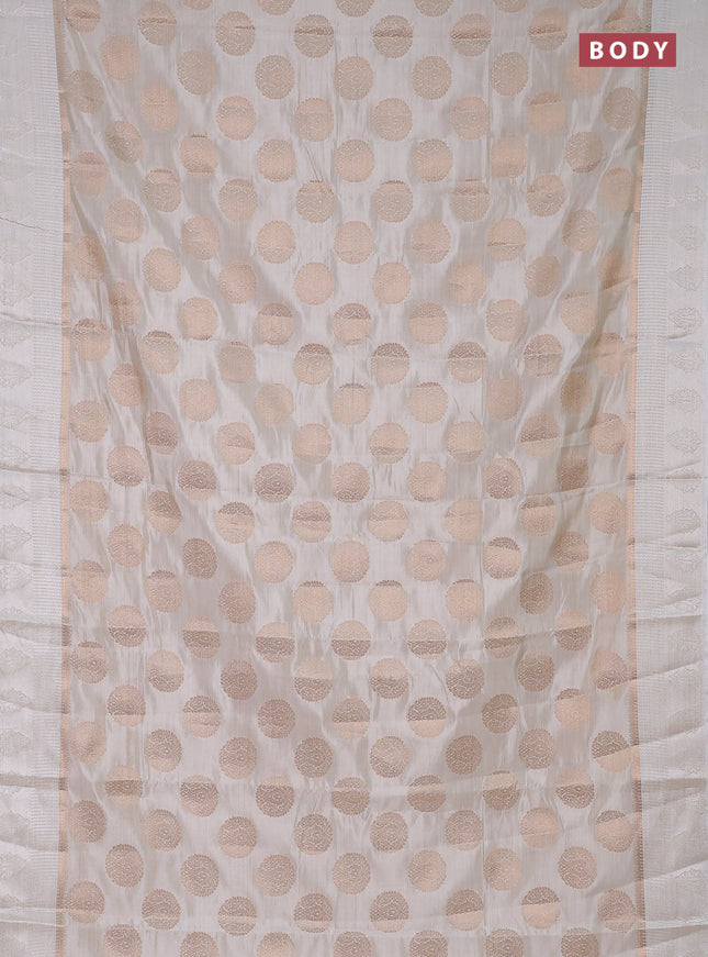 Semi raw silk saree off white with zari woven buttas and zari woven simple border