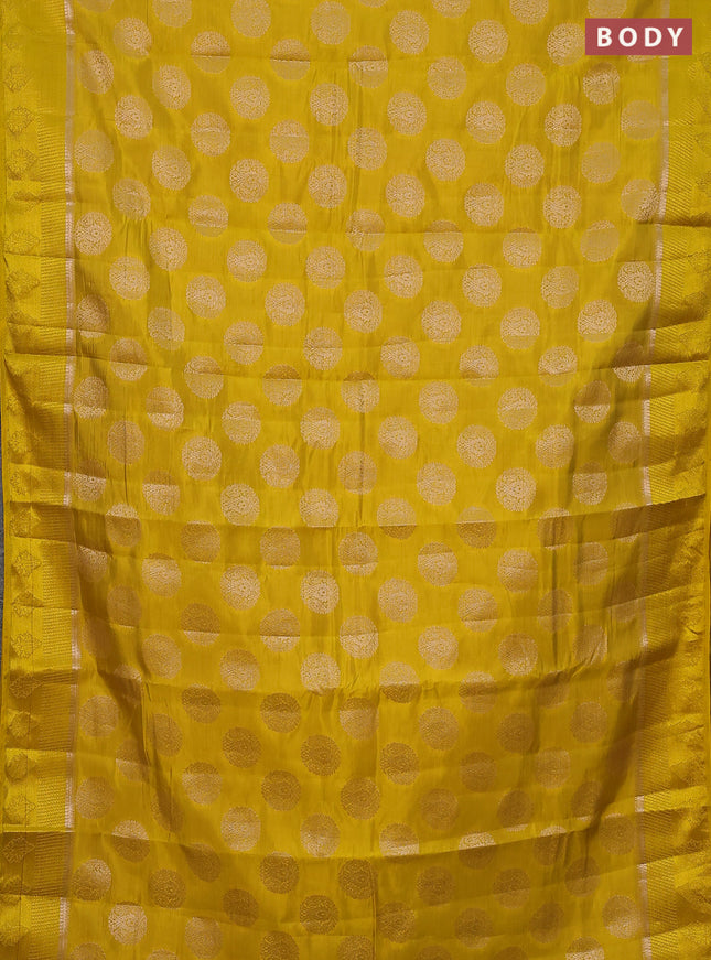 Semi raw silk saree yellow with zari woven buttas and zari woven simple border