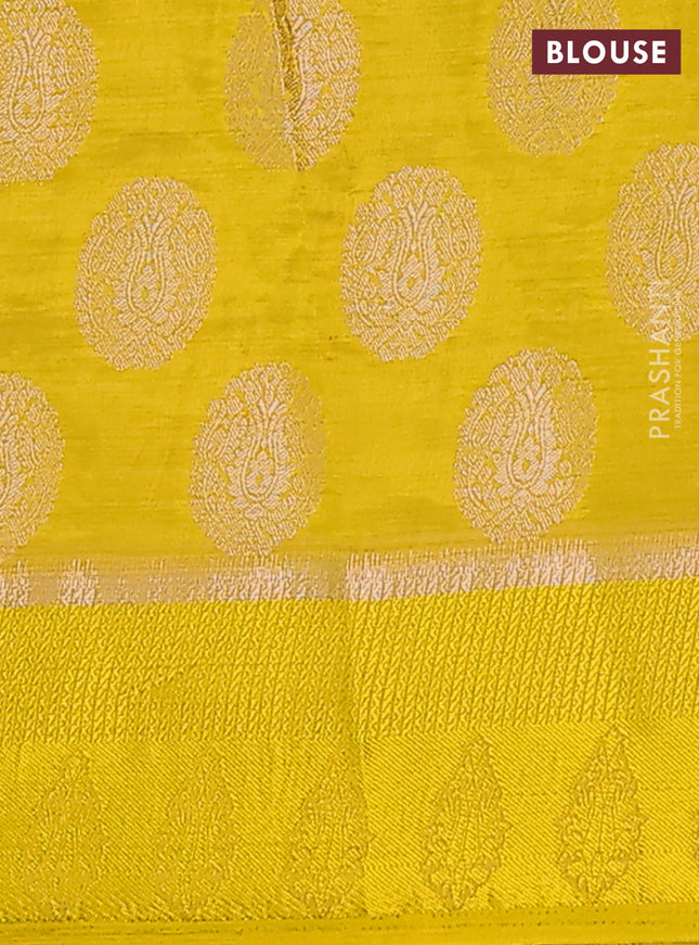 Semi raw silk saree yellow with zari woven buttas and zari woven simple border