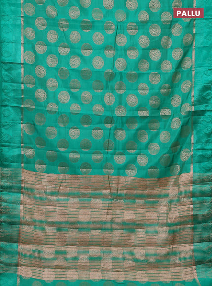 Semi raw silk saree teal green with zari woven buttas and zari woven simple border
