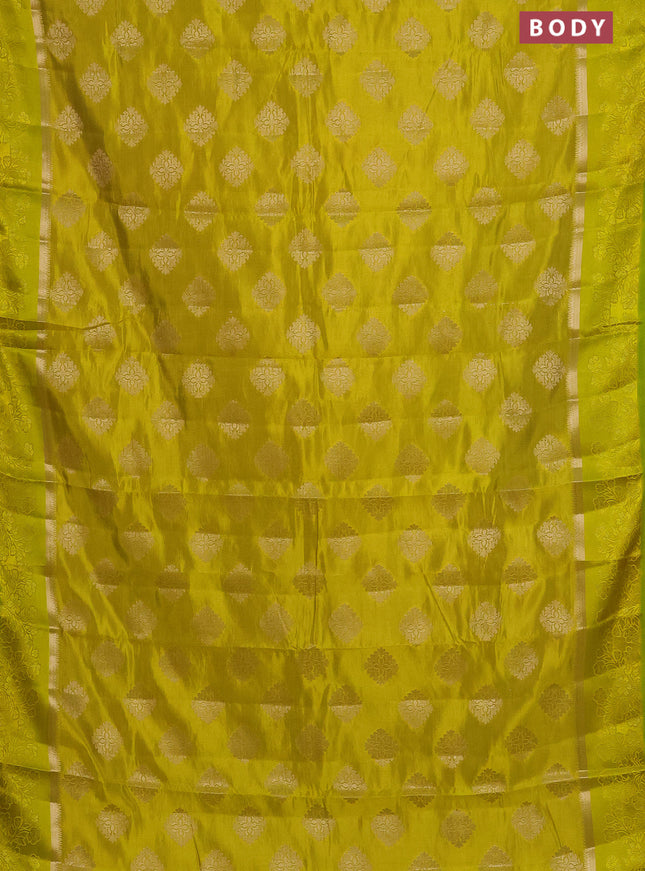 Semi raw silk saree lime yellow with zari woven buttas and zari woven simple border