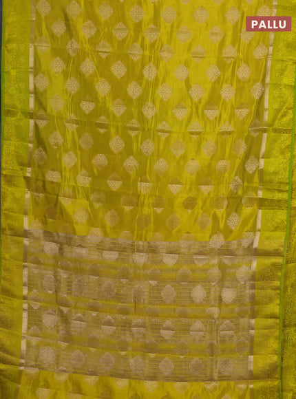 Semi raw silk saree lime yellow with zari woven buttas and zari woven simple border