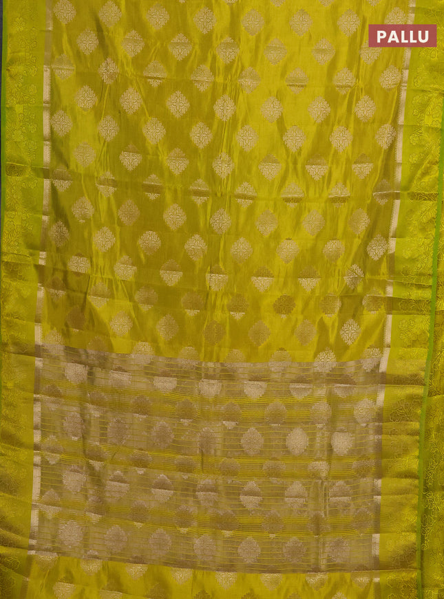 Semi raw silk saree lime yellow with zari woven buttas and zari woven simple border