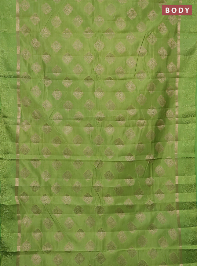 Semi raw silk saree light green with zari woven buttas and zari woven simple border