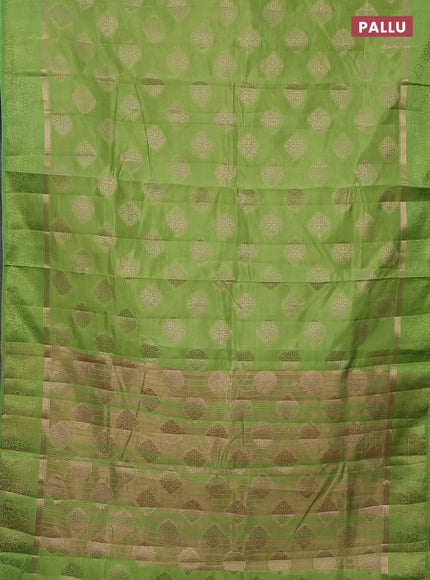 Semi raw silk saree light green with zari woven buttas and zari woven simple border