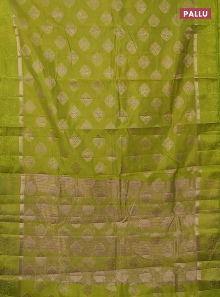 Semi raw silk saree lime green with zari woven buttas and zari woven simple border