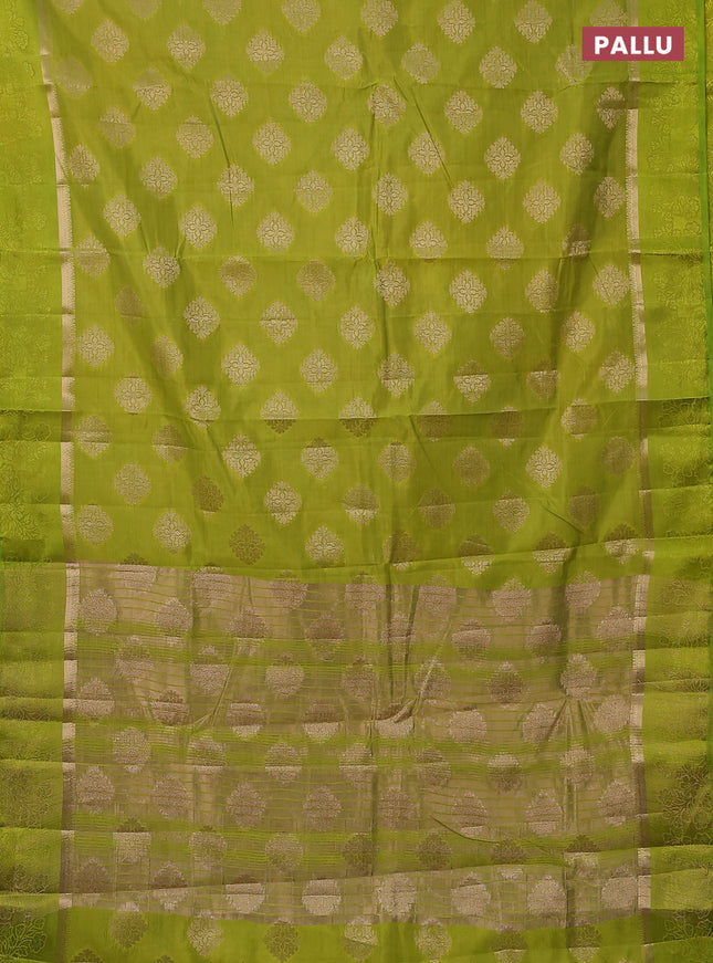 Semi raw silk saree lime green with zari woven buttas and zari woven simple border