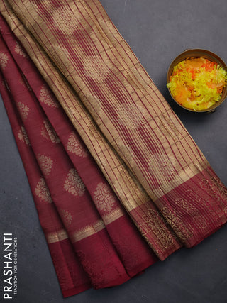 Semi raw silk saree wine shade with zari woven buttas and zari woven simple border