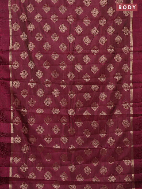 Semi raw silk saree wine shade with zari woven buttas and zari woven simple border
