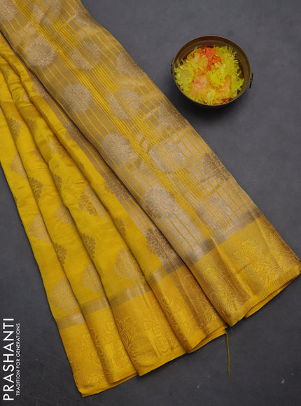 Semi raw silk saree yellow with zari woven buttas and zari woven simple border